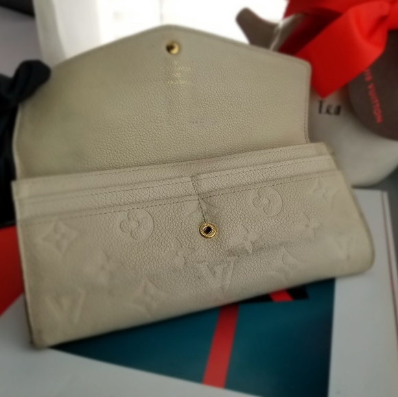 LOUIS VUITTON Portefeuille Empreinte Neige Mono - Picture 2 of 16